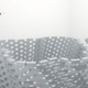 Illustration for article titled Quadcopter Fleet Builds the Leaning Tower of Styrofoam